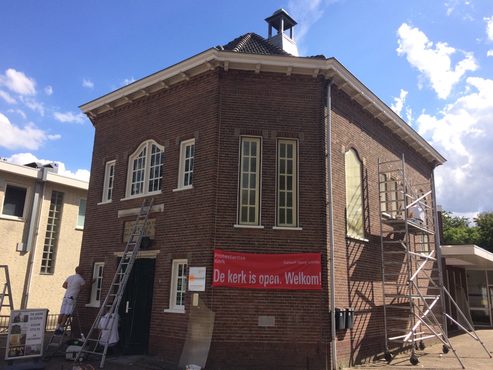 Afbeelding met gebouw, buiten, klok, baksteen Automatisch gegenereerde beschrijving